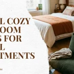 Cozy small bedroom ideas banner for small apartments featuring a terracotta-accented bed and a separate lounging zone with a green corduroy chair.