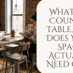 A blog post header image featuring a woman reading a book and drinking coffee at a rustic wooden counter table with industrial metal legs, alongside text that reads "WHAT IS A COUNTER TABLE, AND DOES YOUR SPACE ACTUALLY NEED ONE?".